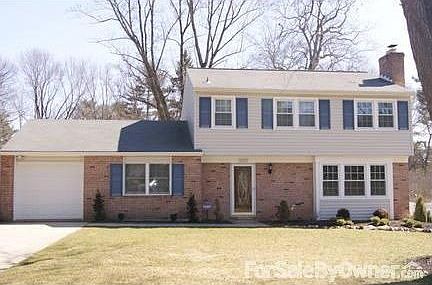 Front view : Updated windows, siding, landscaping, 1 year old garage.
