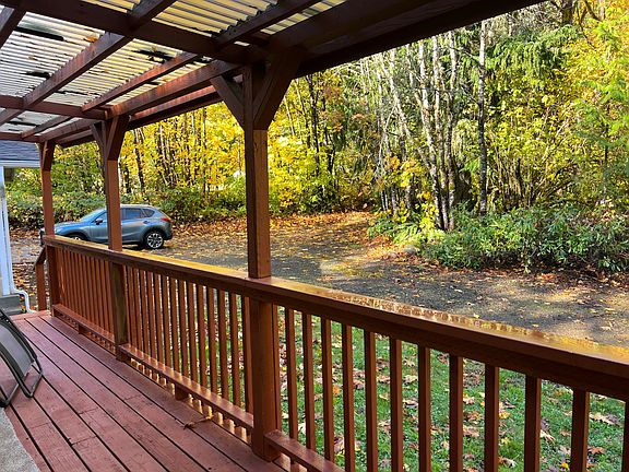 covered front porch, parking and partial front yard