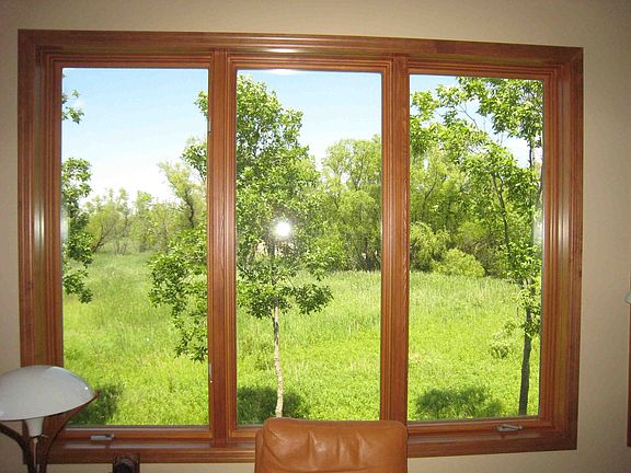 Relax in comfort with full walls of windows, beautiful vistas