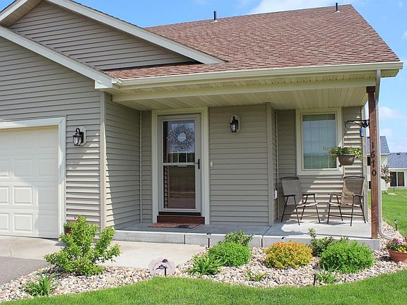 Beautiful landscaping and inviting porch