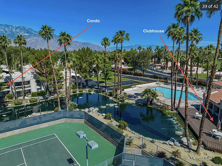View of condo in relation to stream, pool, and tennis courts
