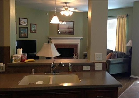 open view from kitchen looking to den & dining area great for staying connected with the family