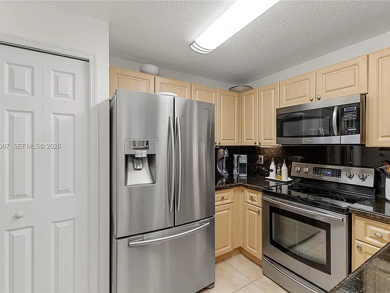 6142 NW 115th Pl #324 — Photo 20