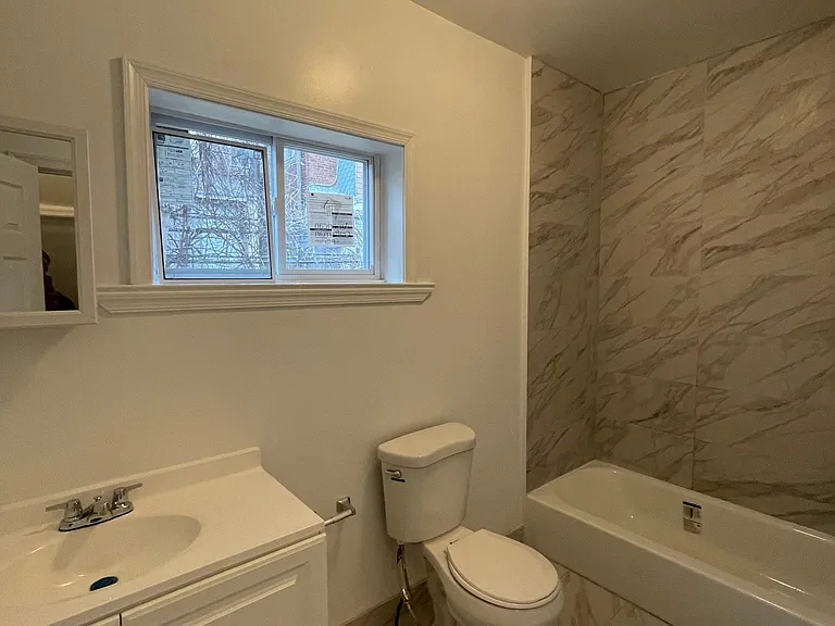 1st floor bathroom with shower and tub