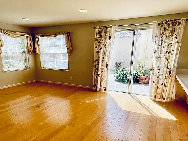 Spacious and bright dining room with sliding door to the backyard