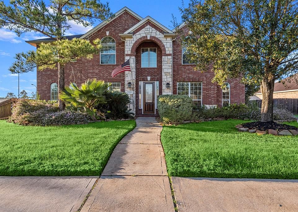 Welcome Home to 12703 Rocky Briar. The location on a beautiful corner lot provides a lovely view of the nearby neighborhood lake. Take a stroll around the picturesque lakes with water features.