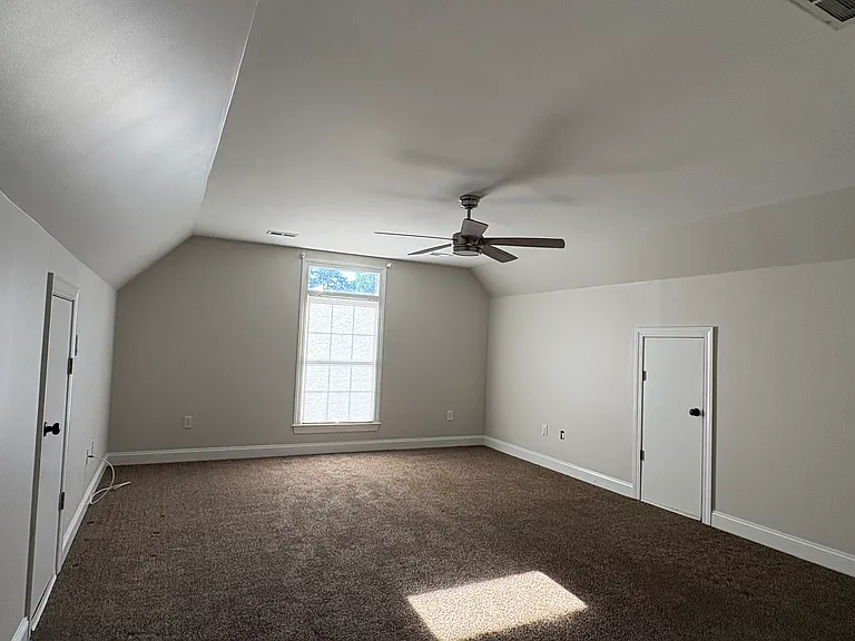 Huge FROG can be a 5th bedroom, an office, recreation or play room. It has a spacious closet with easy access attic storage on each side.