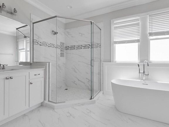 Large custom shower with soaking tub