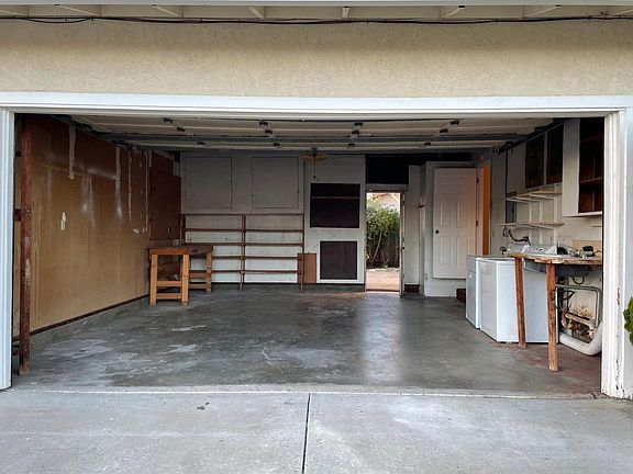 2 car garage, washer/dryer, storage