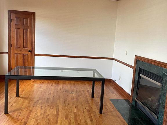 Office/Den on main floor with fireplace.