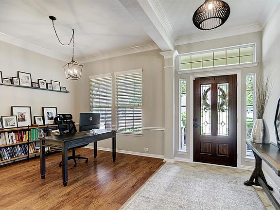 Dining room area is being used as an office.