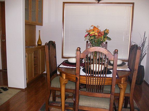 Dining Room with built in Hutch and Cherrywood Laminate floors