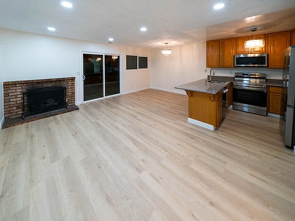 Family Room with open plan has kitchen and dining area as well.