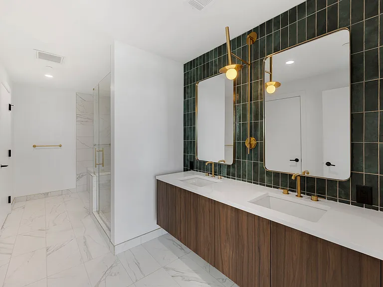 Luxurious bathroom with tub/shower combo and dual undermounted sinks