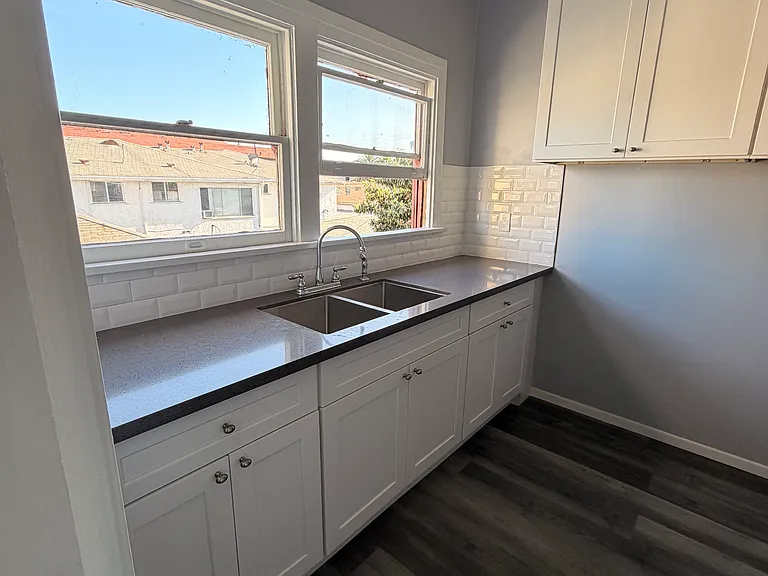 newly remodeled kitchen sink and food prep area