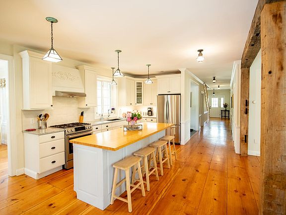 Kitchen with walk-in pantry Dining room is to the left, family room to the right