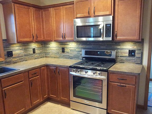 Slate Backsplash with LED undercabinet lighting