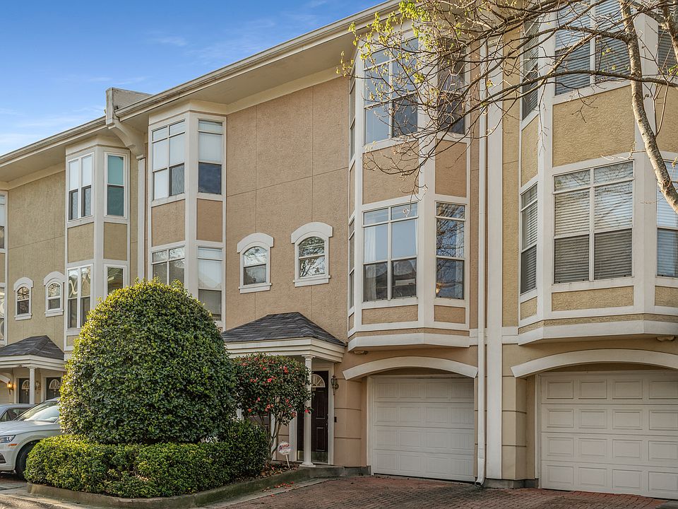 Front door with access to private garage