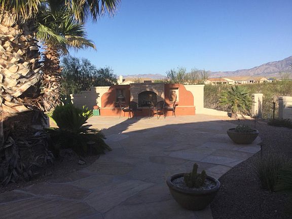Outdoor Fireplace and Hot Tub overlooking the Beautiful View