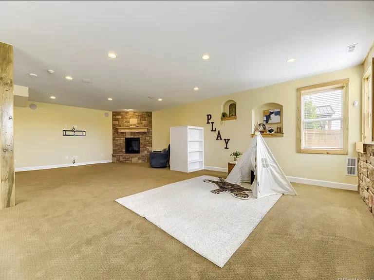 Large, open, walk-out basement with a bedroom, full bath and kitchenette.