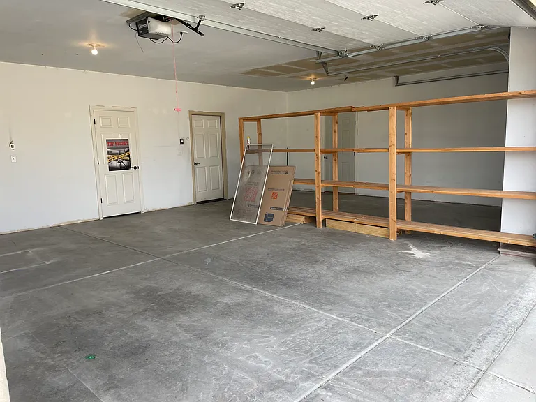 Garage with wooden shelving