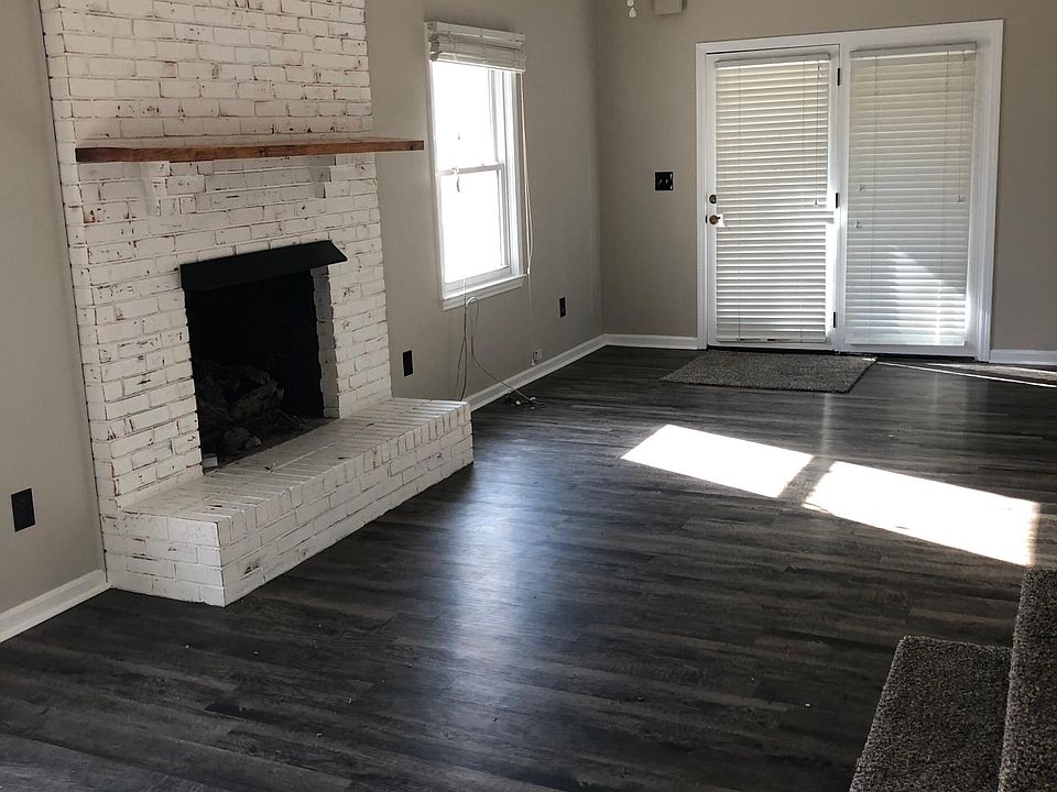 Sunken bonus room/master bedroom with gas fireplace and natural lighting. Full bathroom with walk in closet/storage area or pantry area.