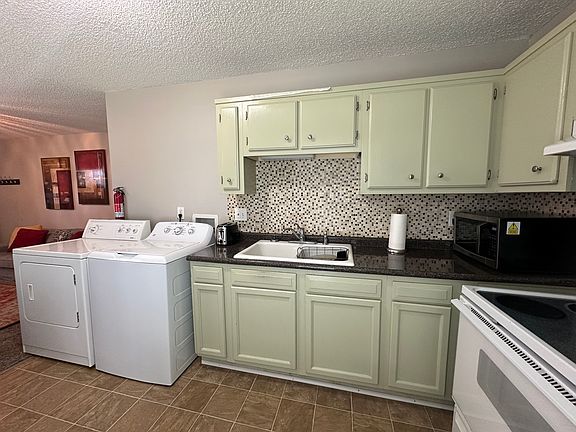 kitchen and washer and dryer