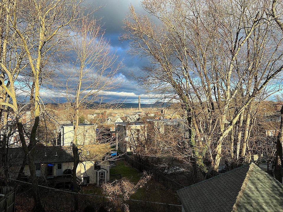 View from kitchen window overlooking downtown Chicopee and the Mt. Tom Range