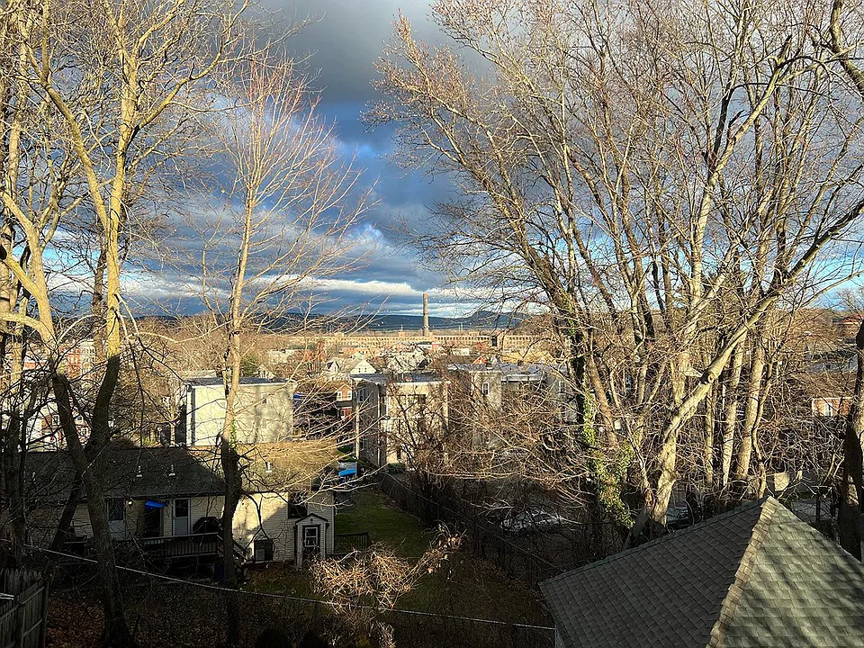 View from kitchen window overlooking downtown Chicopee and the Mt. Tom Range