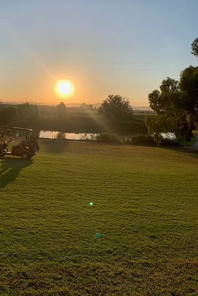 golf course at sunset