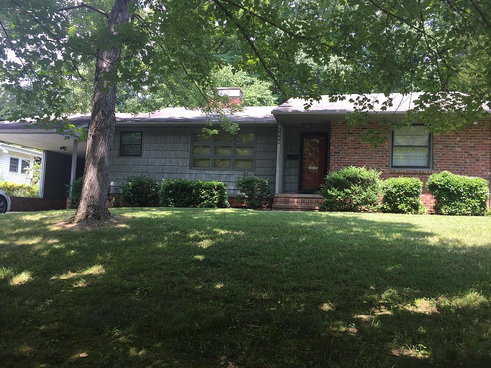 Front of house with carport