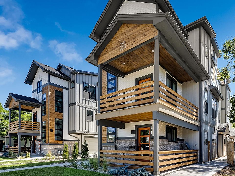 5634 South Curtice, end unit with private 2 car garage & roof deck with mountain views.