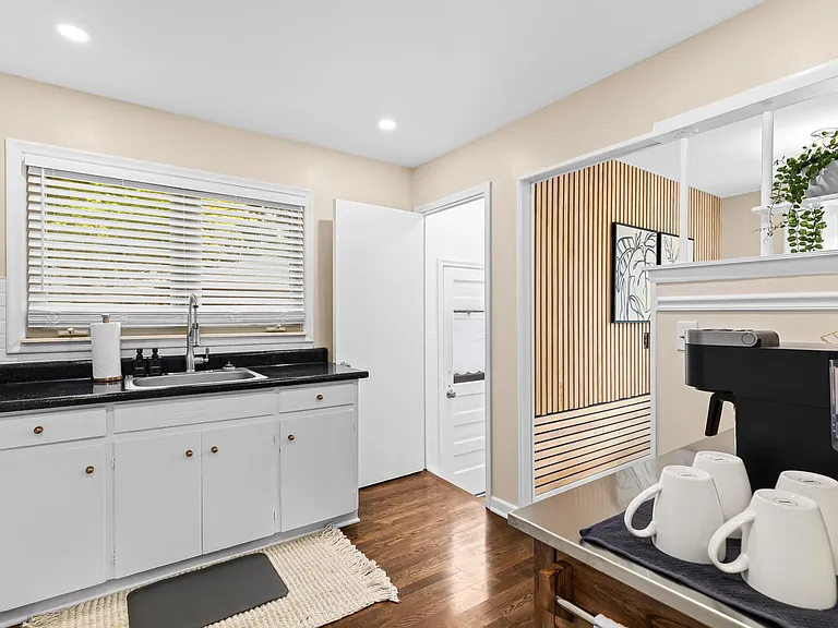 The kitchen is also well-lit and spacious, making it a pleasant place to spend time.