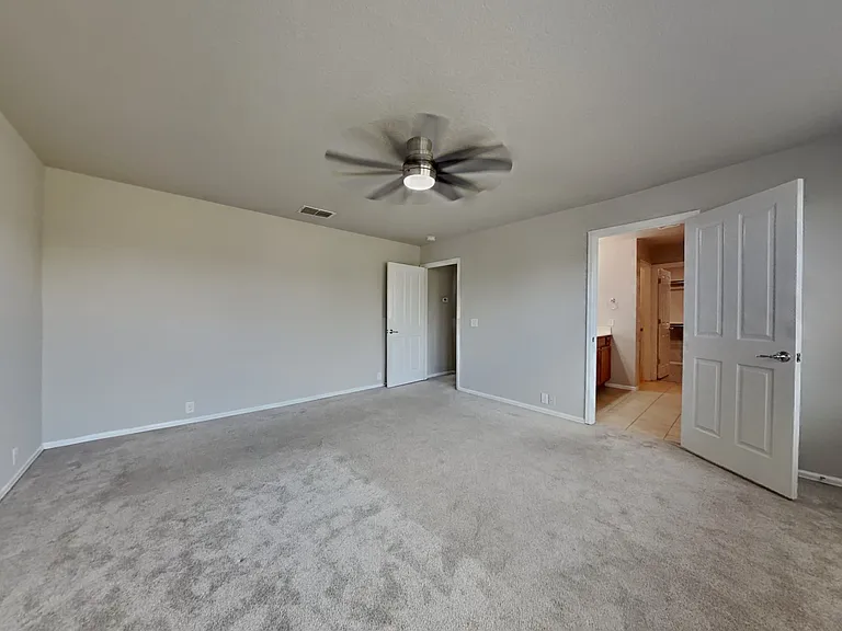 Spacious room with neutral gra