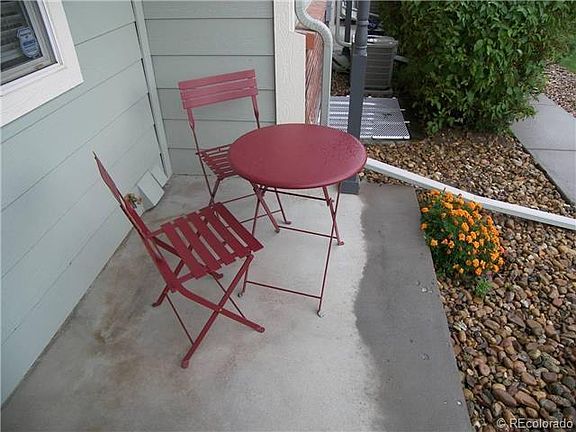 Front porch. Recessed overhead light is programmable with a