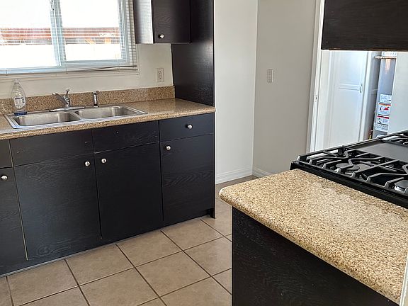 3rd image of 7452 Woodley Ave