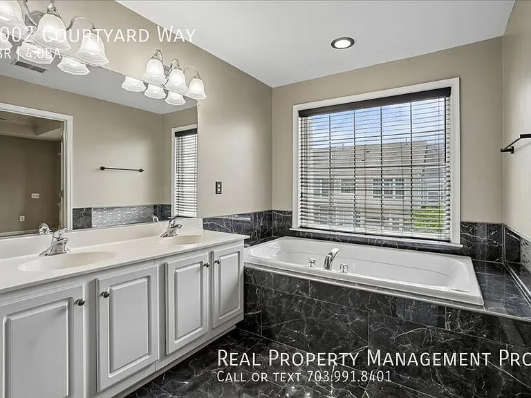 7002 Courtyard Way — Photo 21