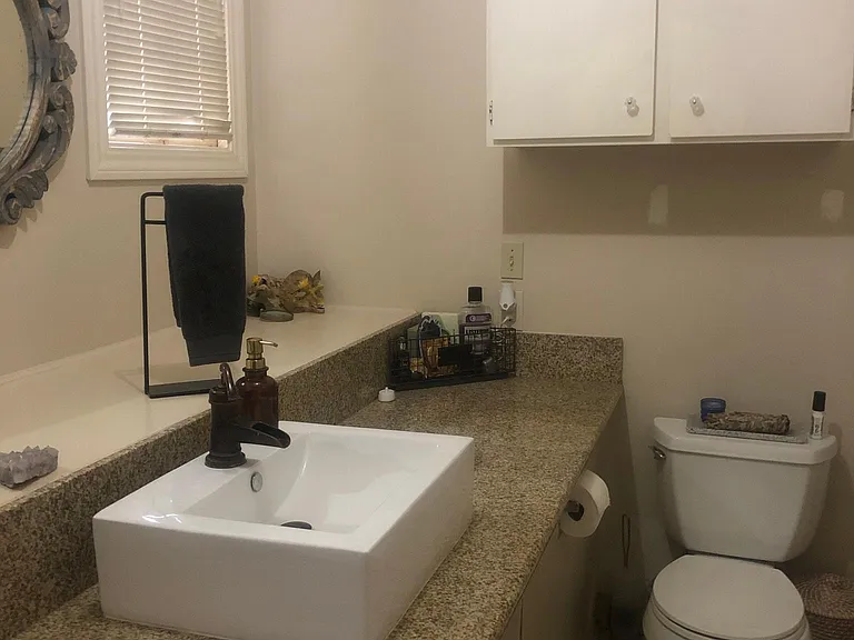 Another view of bathroom, which is off the kitchen