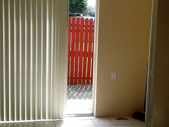Dining area with separate laundry room off kitchen