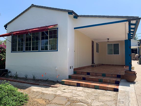 Beautiful front porch is great for semi-private day and night use.