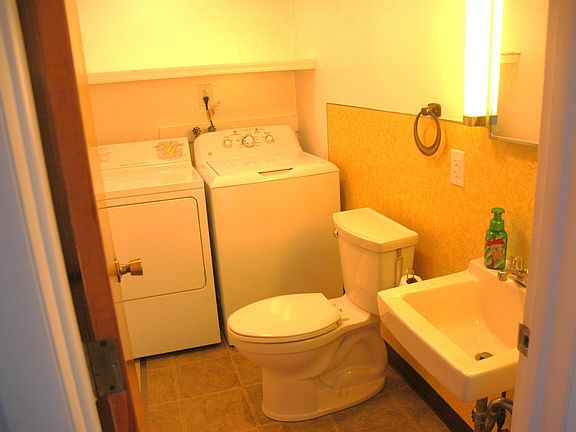 Laundry with half bath