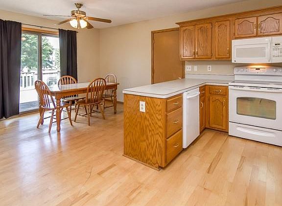 Open plan kitchen and dining area.  Easy access to the large deck and back yard