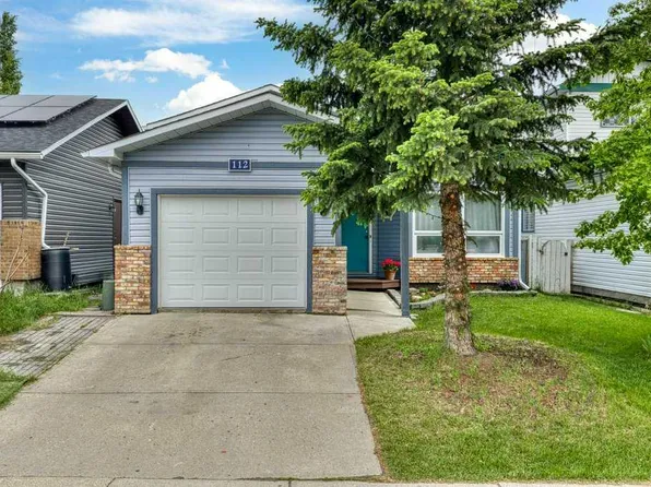 112 S Cedargrove Way SW, Calgary, AB T2W 4V2