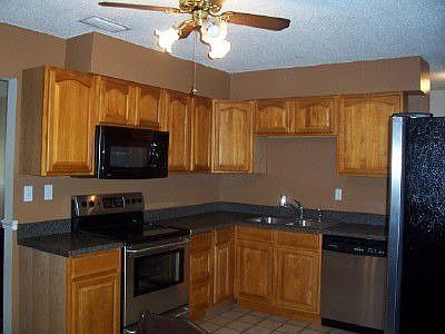 Kitchen updated with new cabinets. and stainless steel appliances.