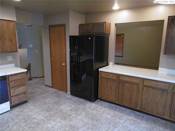 Pantry & Serving Window to Living Rm