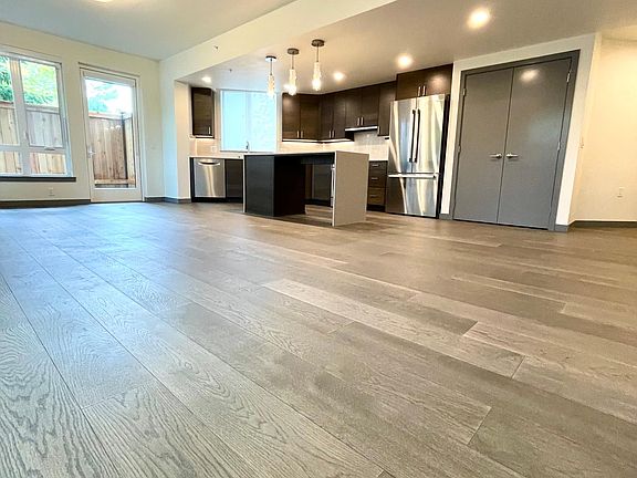 Open concept kitchen, dining, and living room