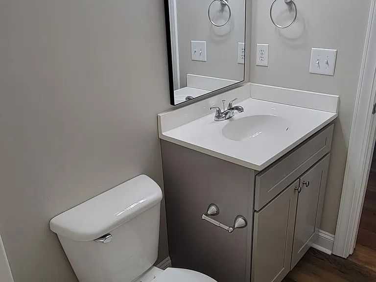 Hall bath new vanity with soft close doors.
