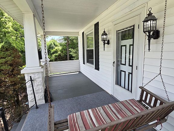 Large front porch with swing