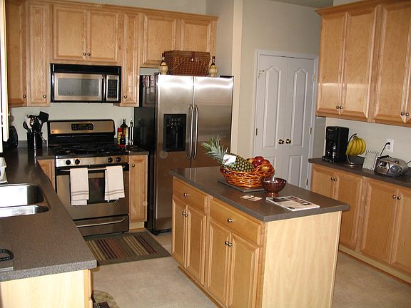 Kitchen with stainless steel and 42 inch cabinets