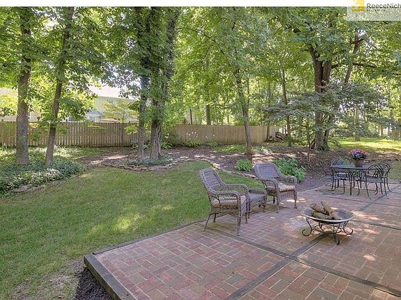 Spacious Brick patio perfect for enjoying the beautiful outdoors & entertaining!